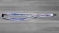 Purple lanyard with Women and Girls just want to have Fundamental Human Rights